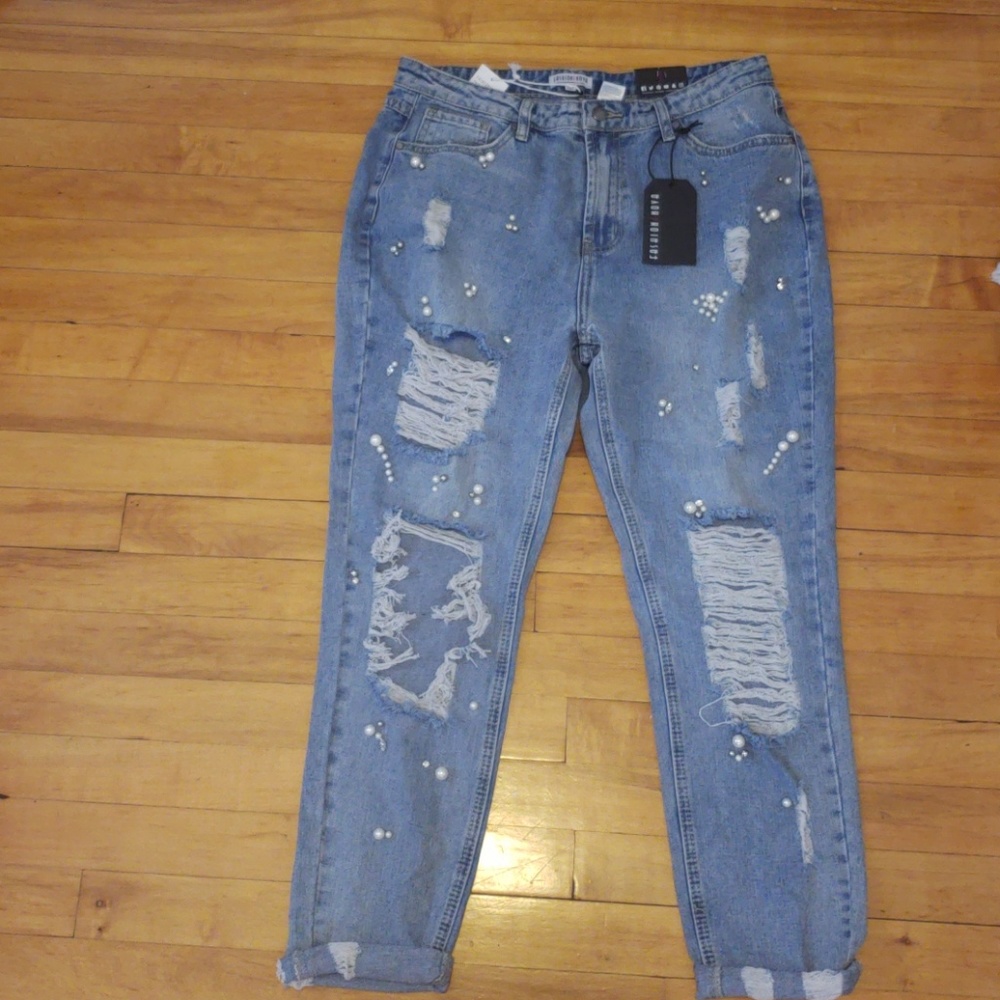 Distressed pearl boyfriend jeans